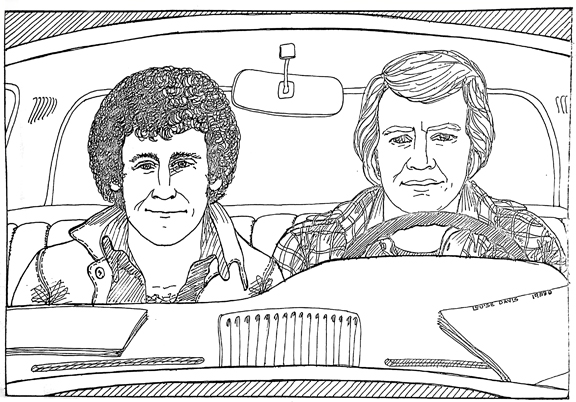 Starsky and Hutch in the car, together. Hutch is driving. Both seem happy.